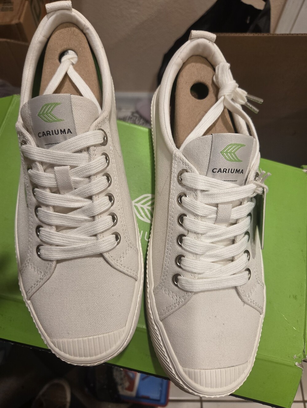 Unisex  Cariuma White Canvas Sneakers with Green Logo Accent